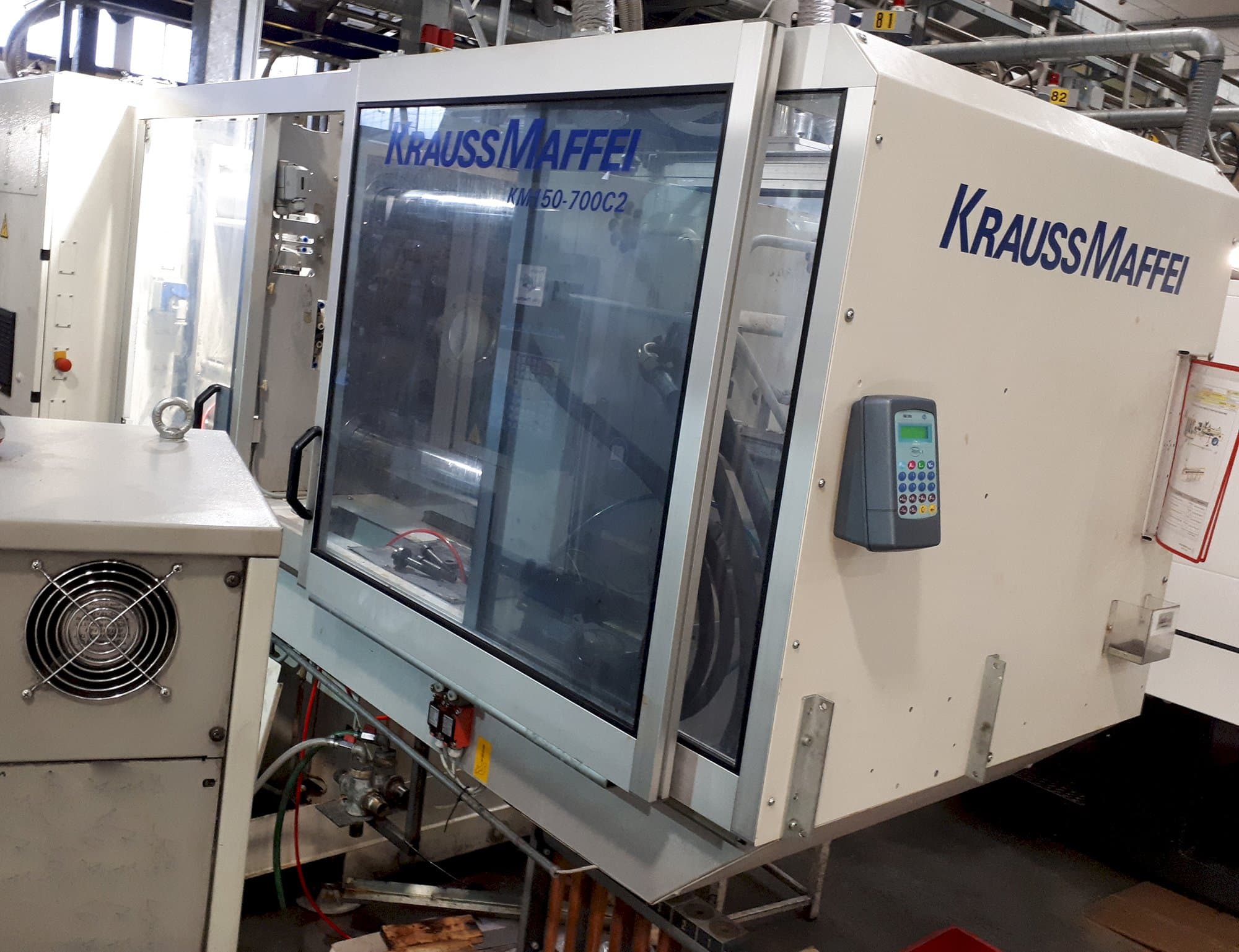 Krauss Maffei Mašinos dešinės pusės vaizdasC2 150-700