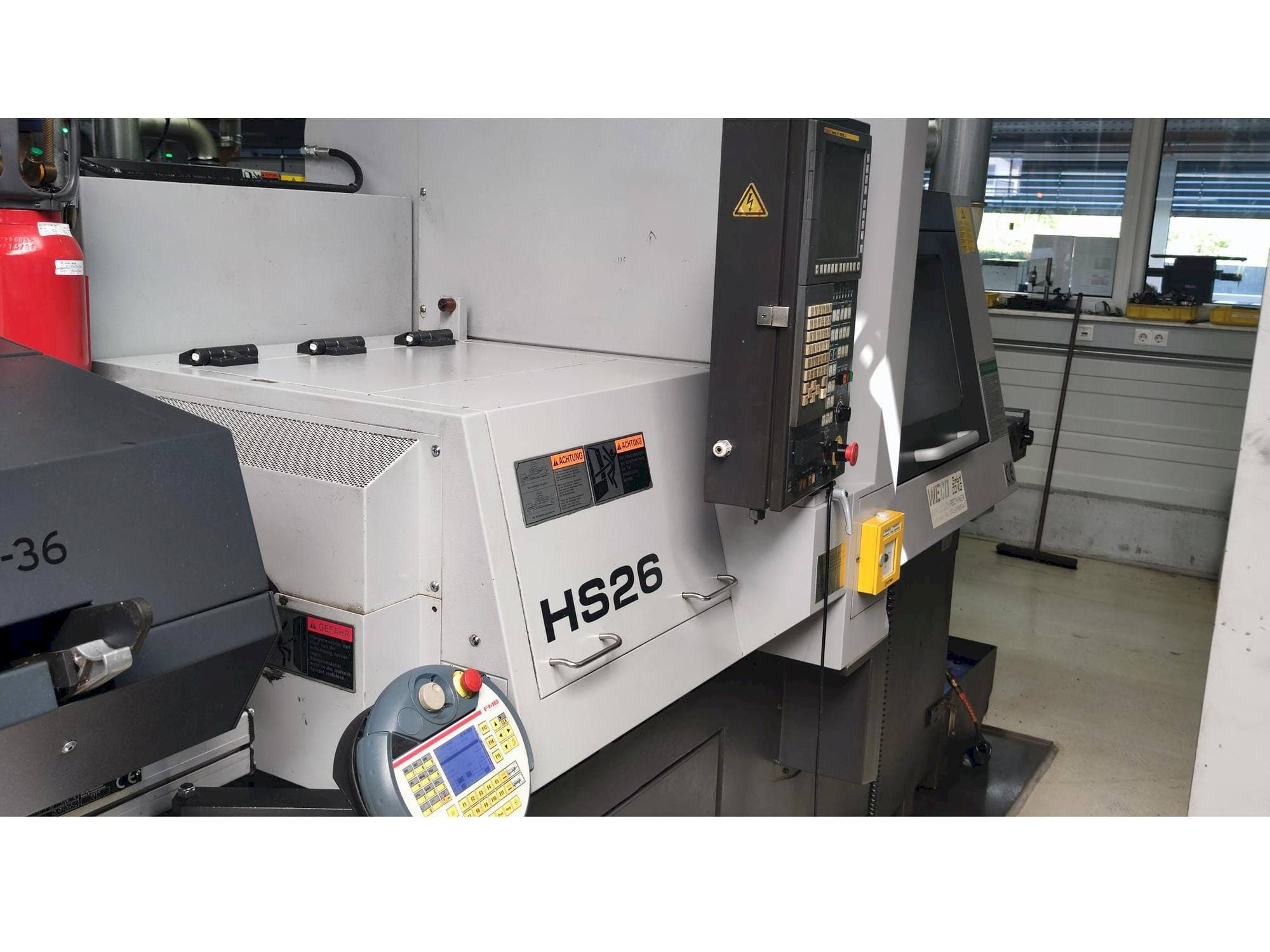 TSUGAMI HS26 Mašinos vaizdas iš kairės pusės