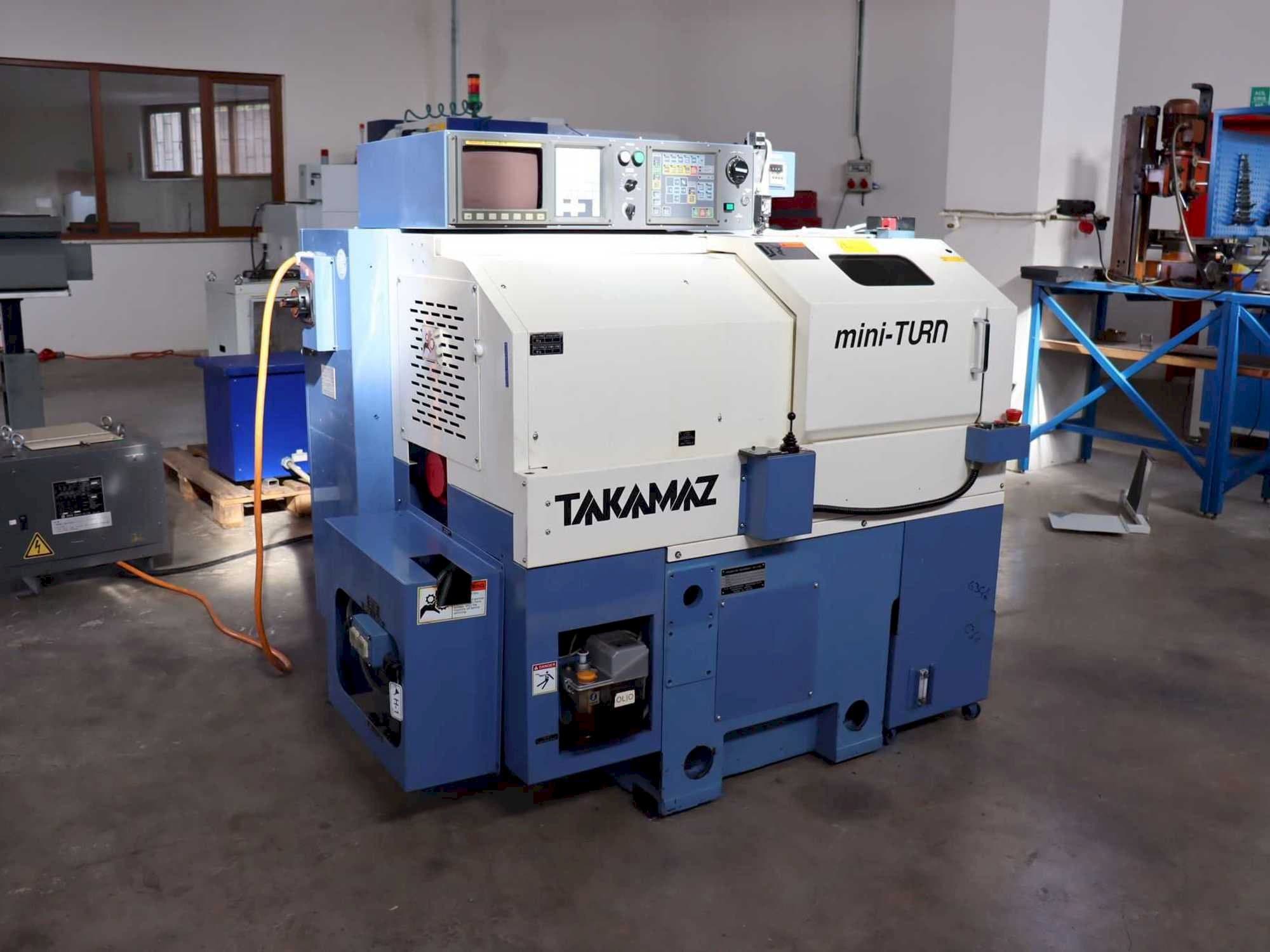 Takamaz mini-Turn Mašinos vaizdas iš priekio