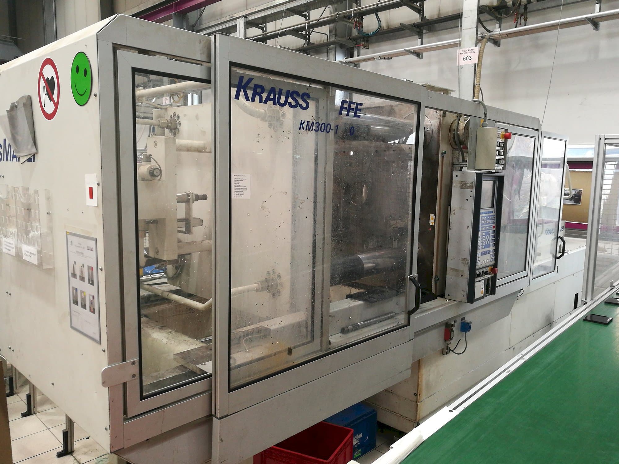 Krauss Maffei Mašinos kairės pusės vaizdasKM 300-1400 C2