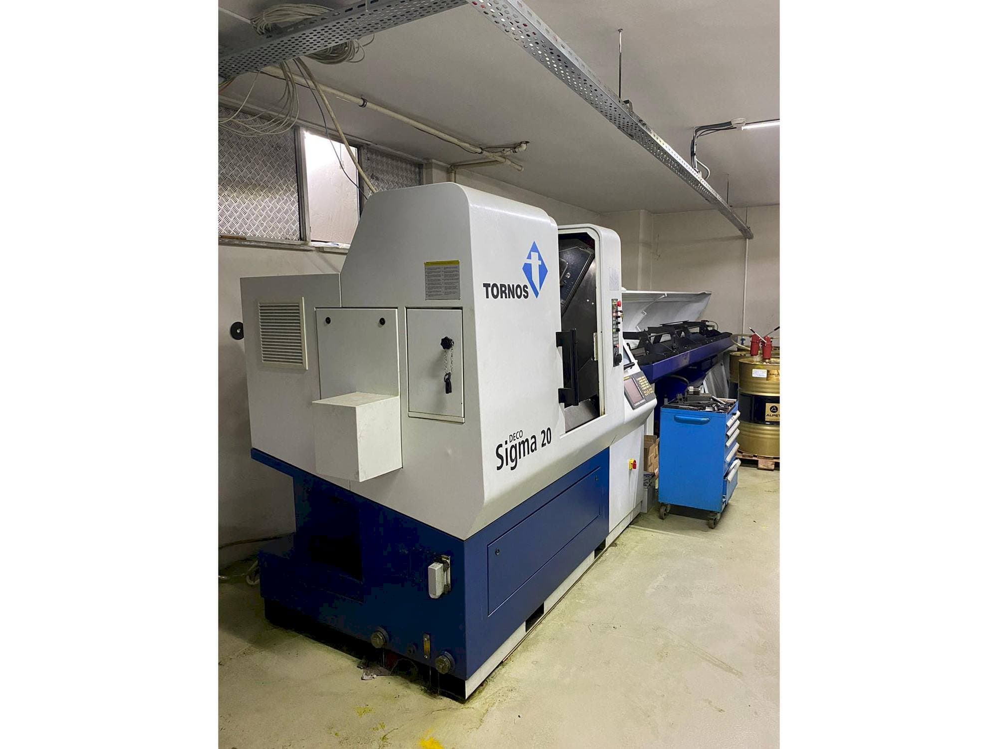Tornos Delta Sigma 20 Mašinos vaizdas iš kairės pusės