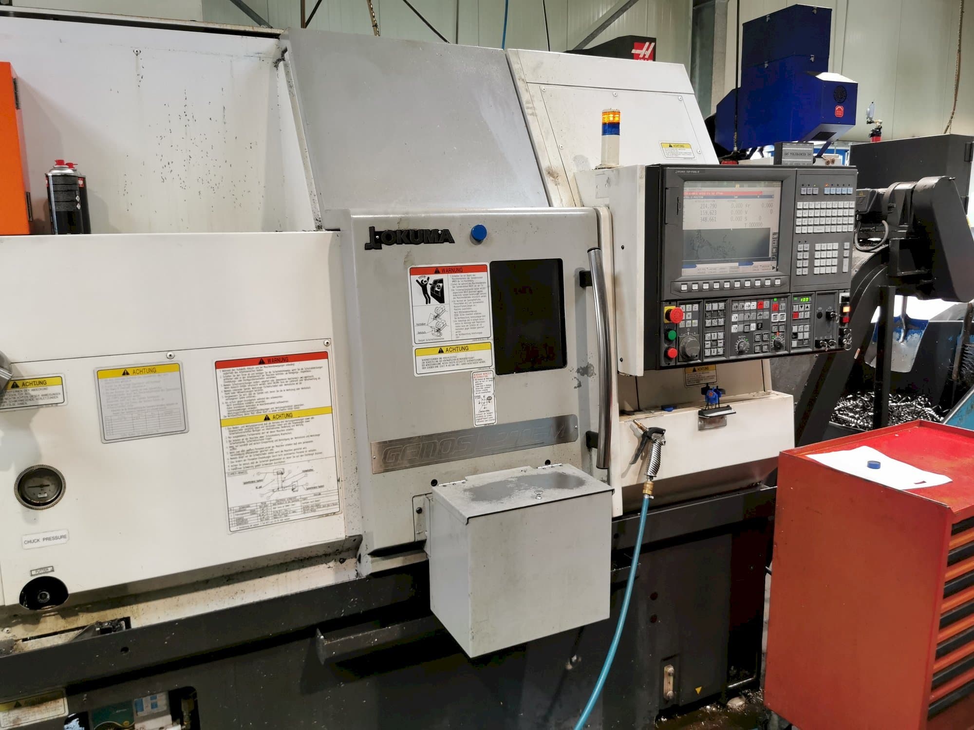 Okuma GENOS L200E-MY Mašinos vaizdas iš priekio