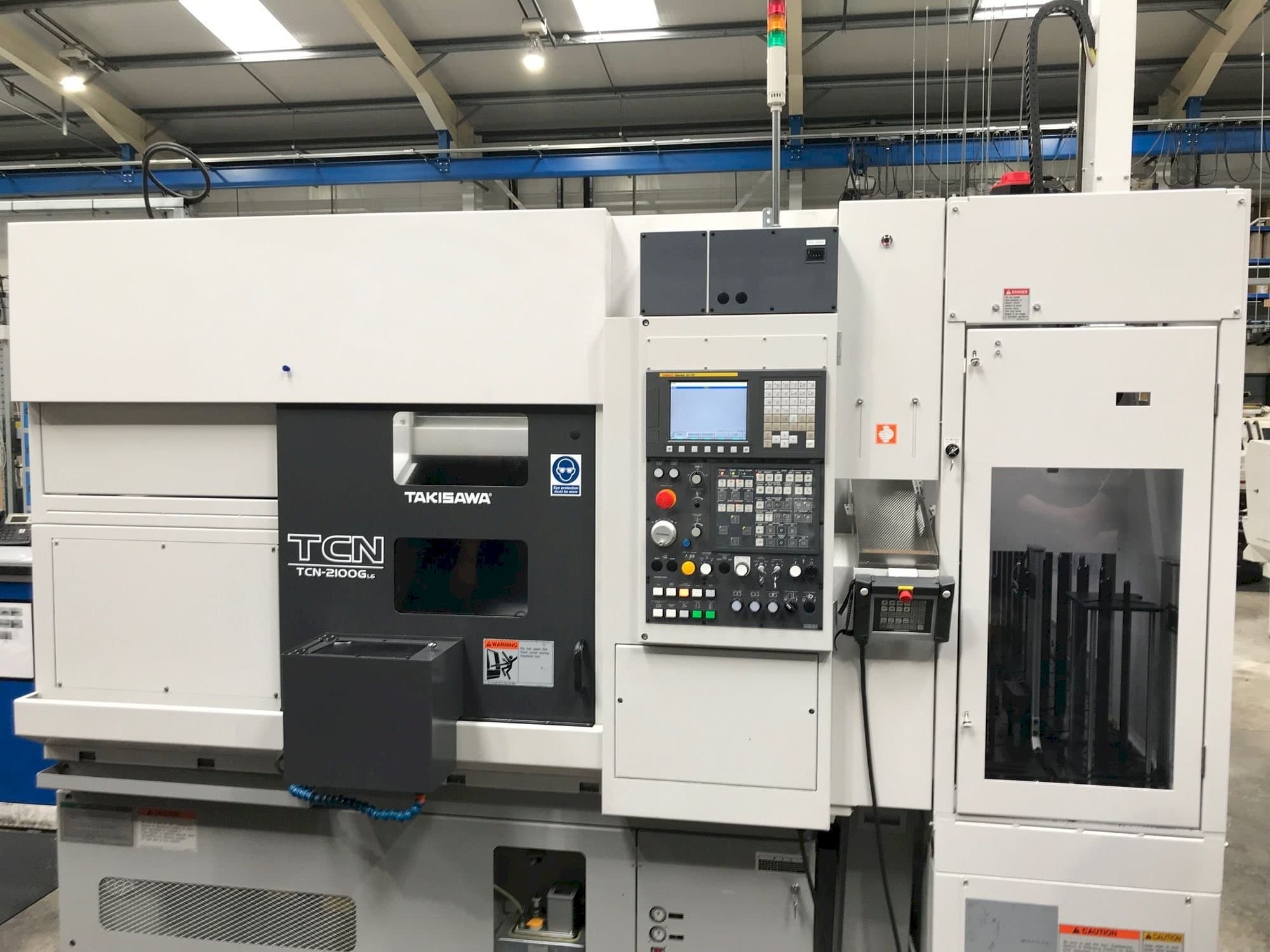 Takisawa TCN-2100G L6 Mašinos vaizdas iš priekio