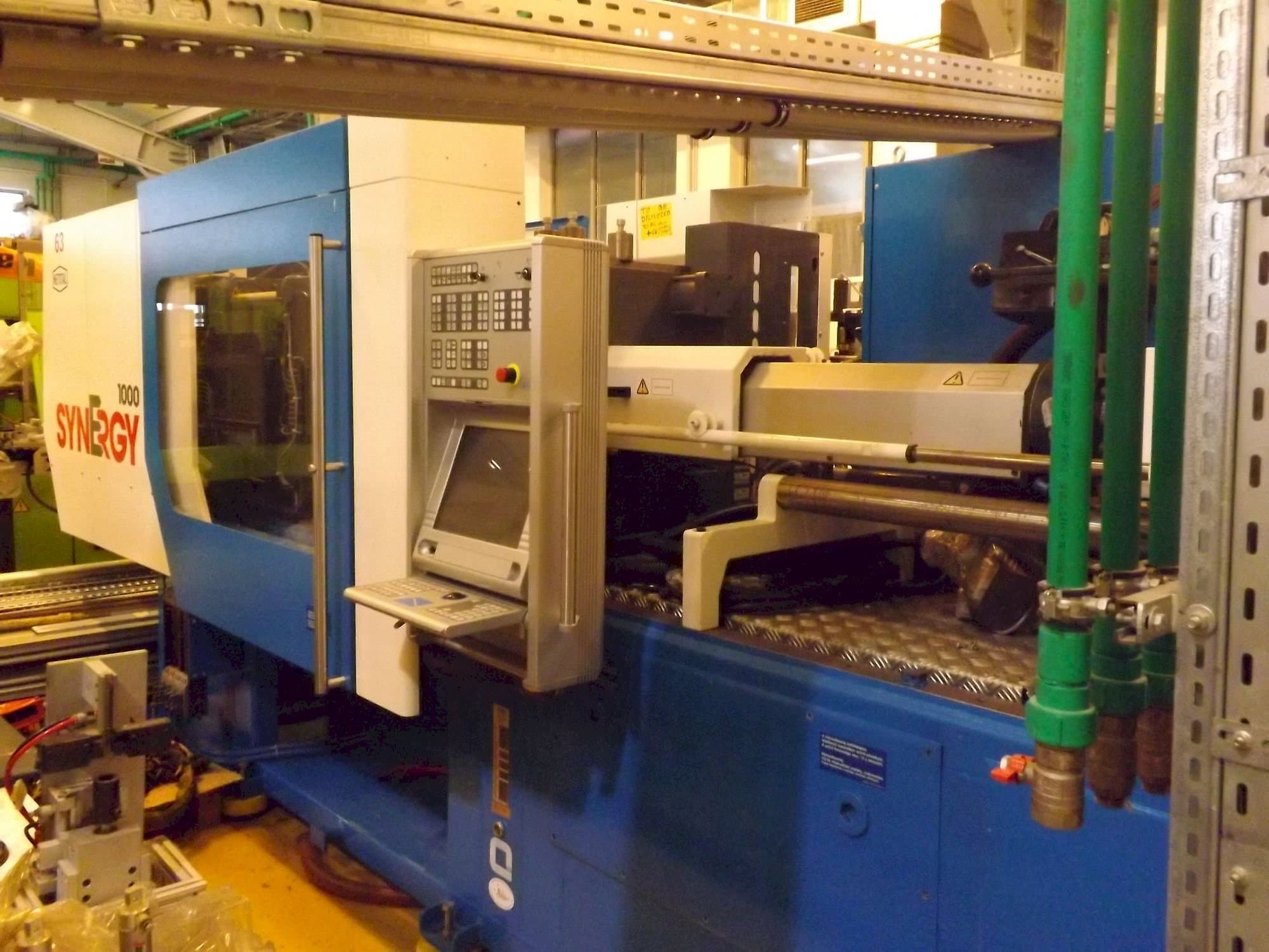 Netstal Synergy 1000 230-110 Mašinos vaizdas iš priekio