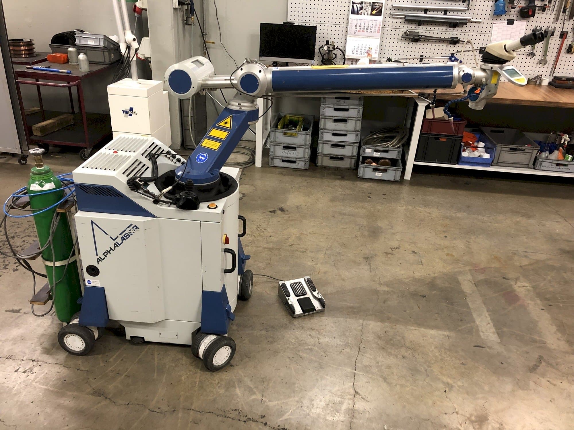 ALPHA LASER ALM 200 Mašinos kairės pusės vaizdas