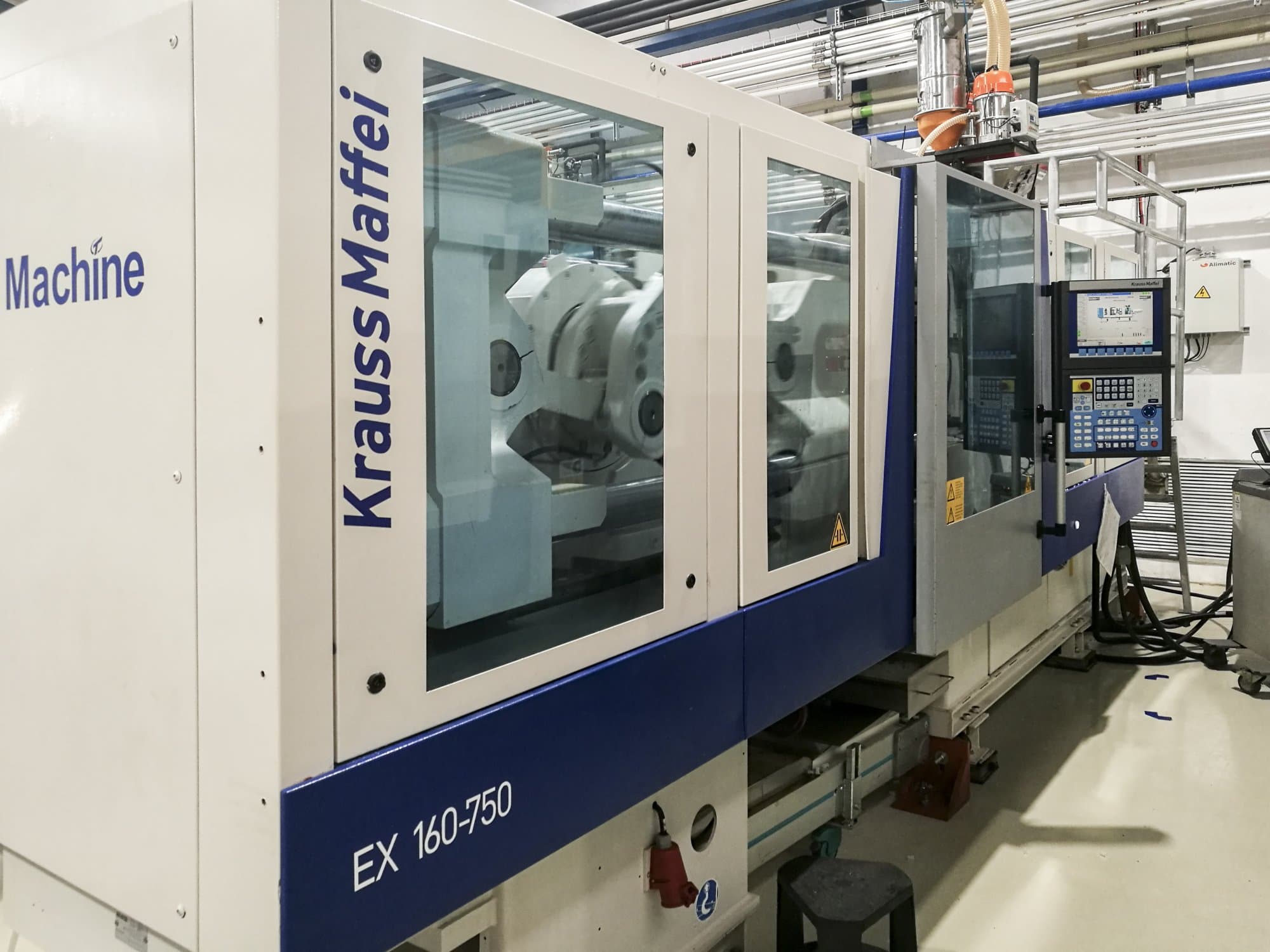 Krauss Maffei 160-750 EX Mašinos kairės pusės vaizdas