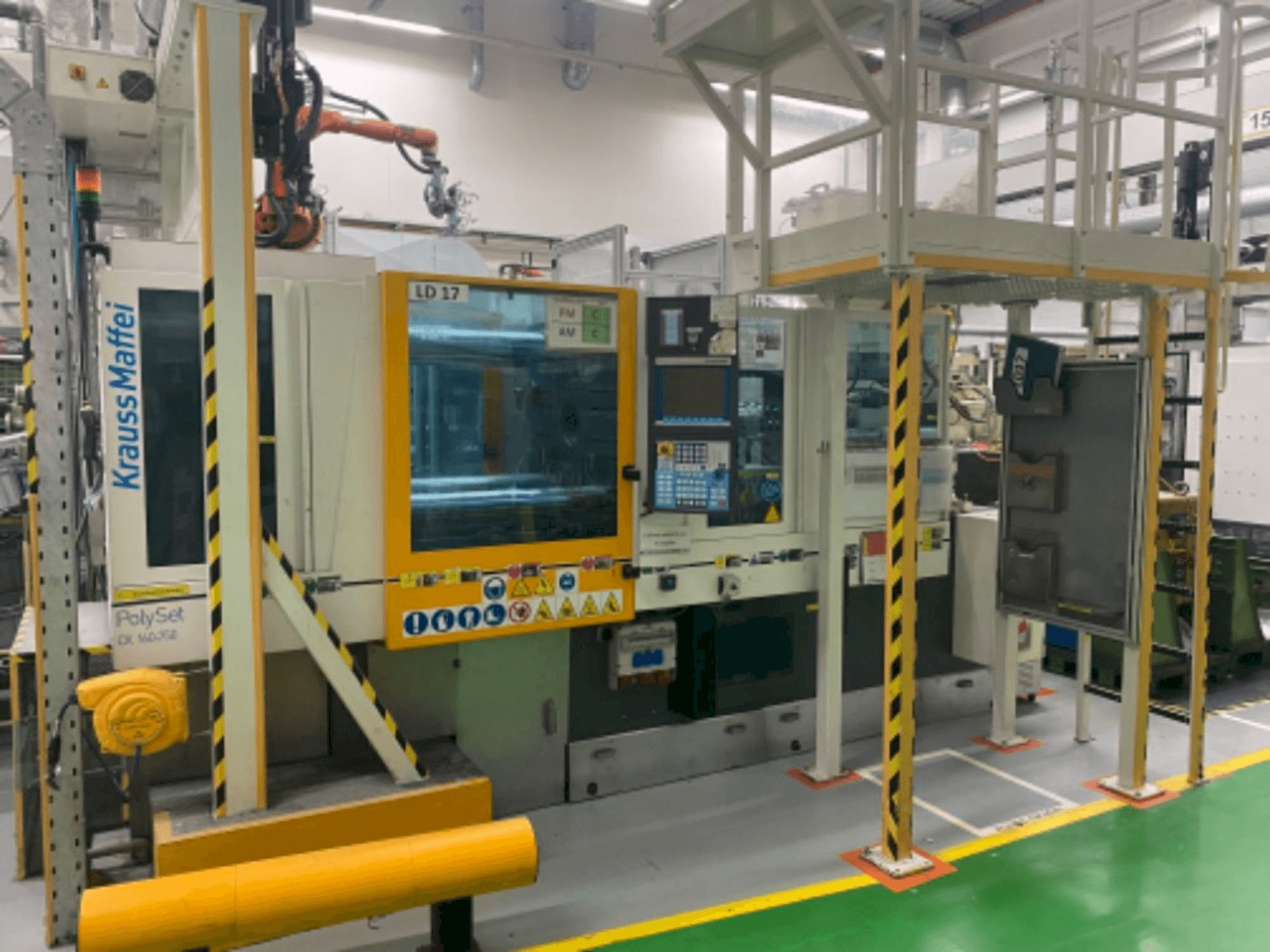 Krauss Maffei 160/750 CX POL Mašinos vaizdas iš priekio