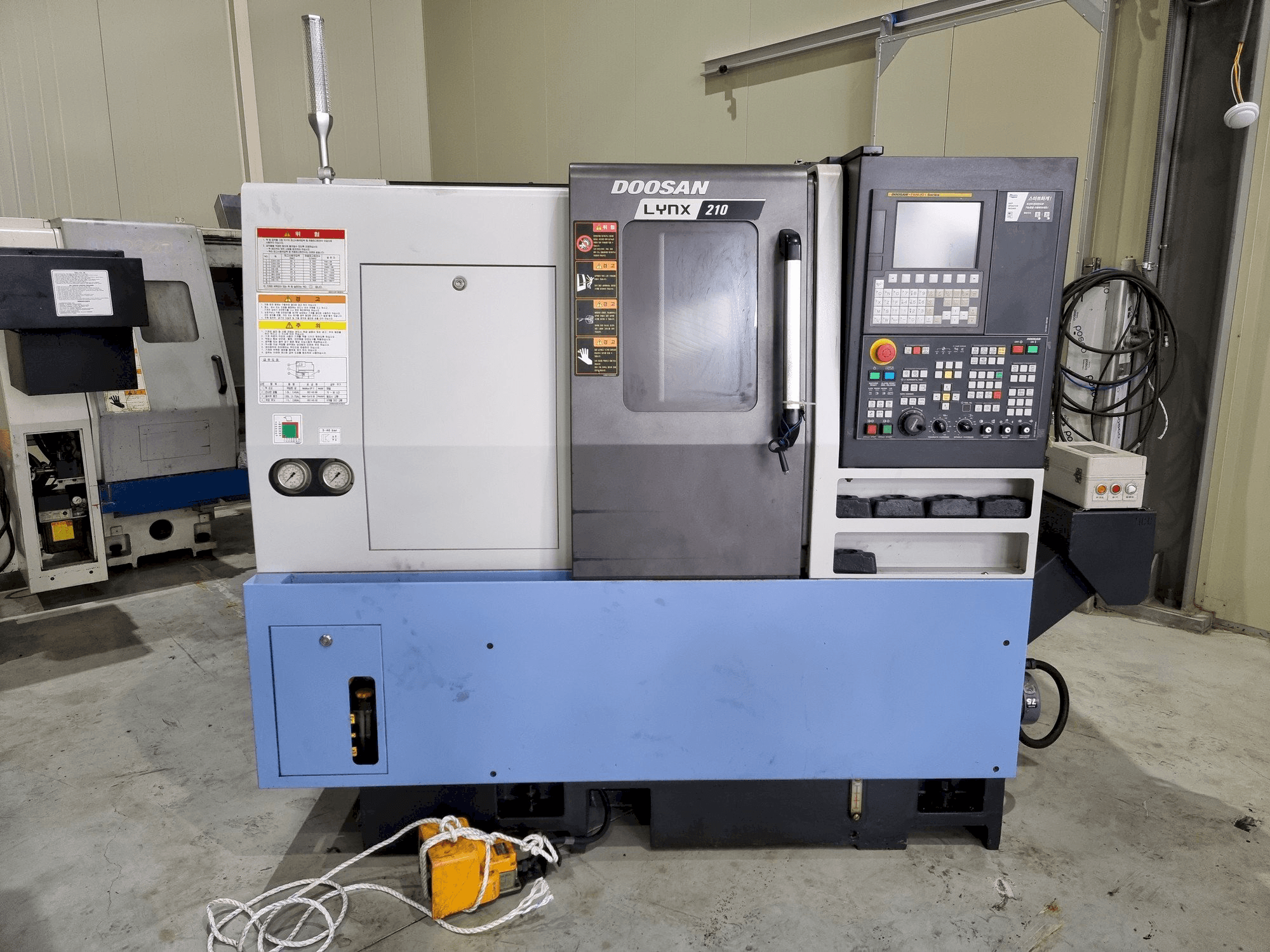 Doosan LYNX 210 Mašinos vaizdas iš priekio