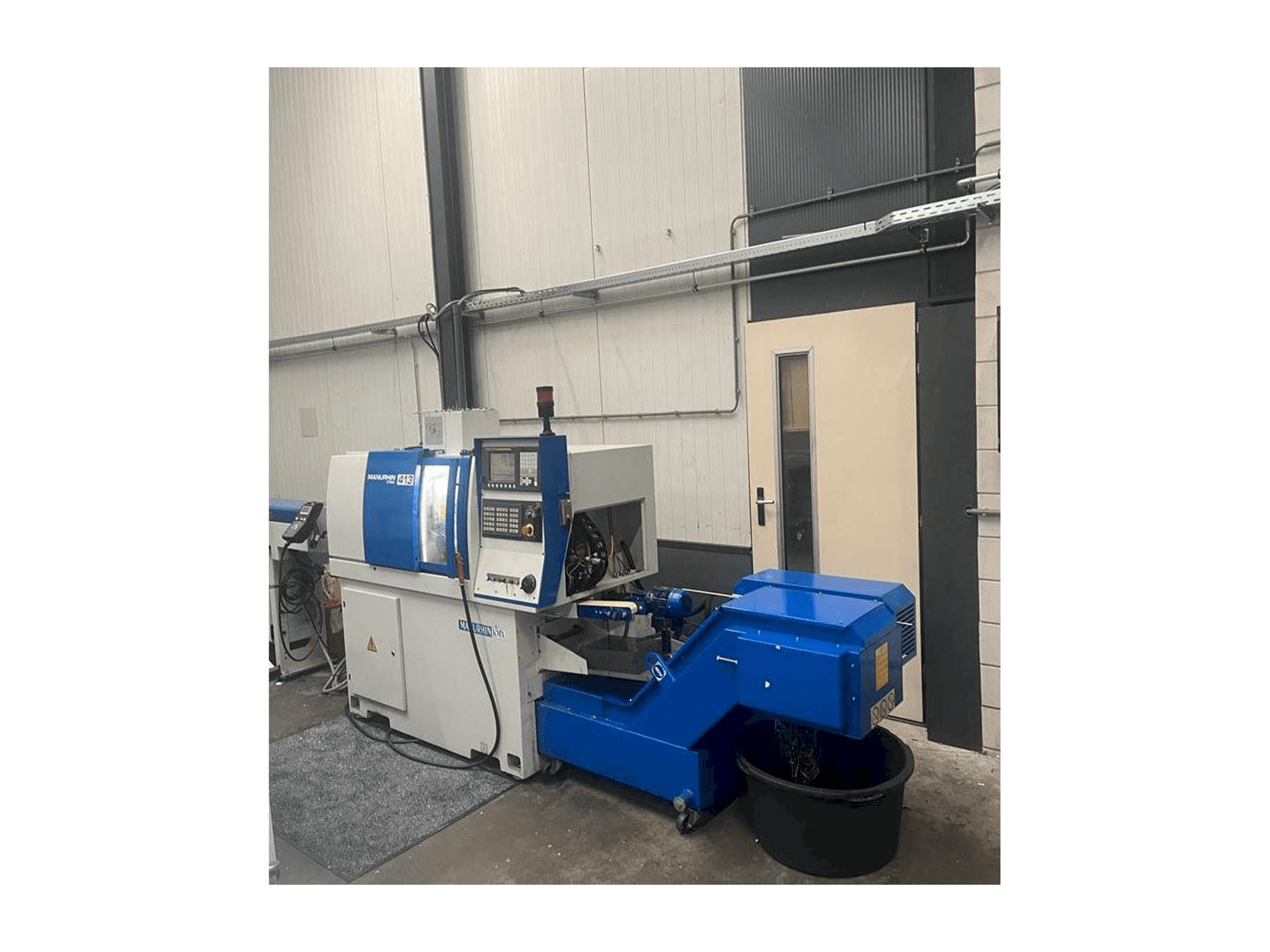 Manurhin K'MX 413 Mašinos vaizdas iš priekio