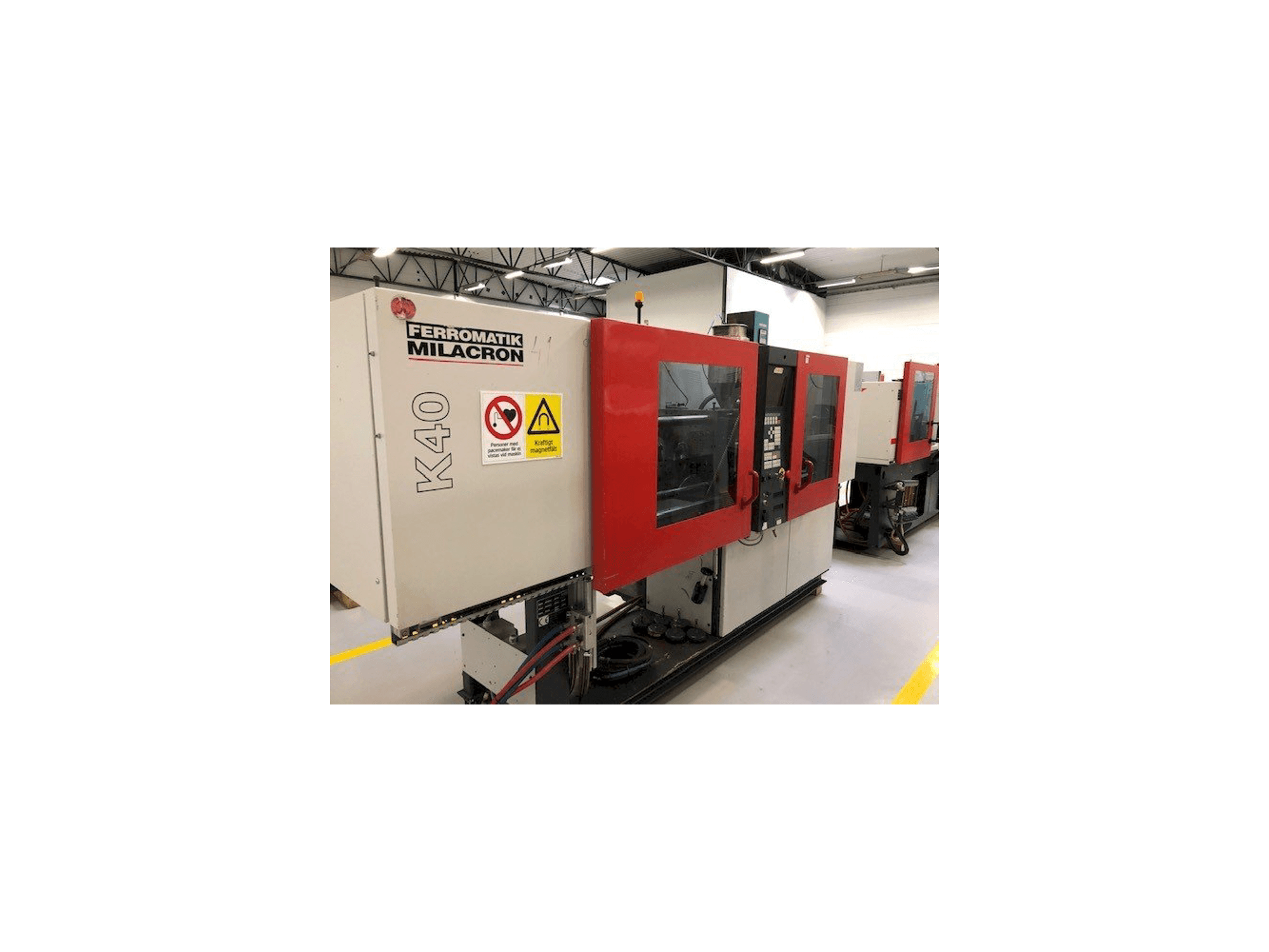 FERROMATIK MILACRON K40 D-E Mašinos vaizdas iš kairės pusės
