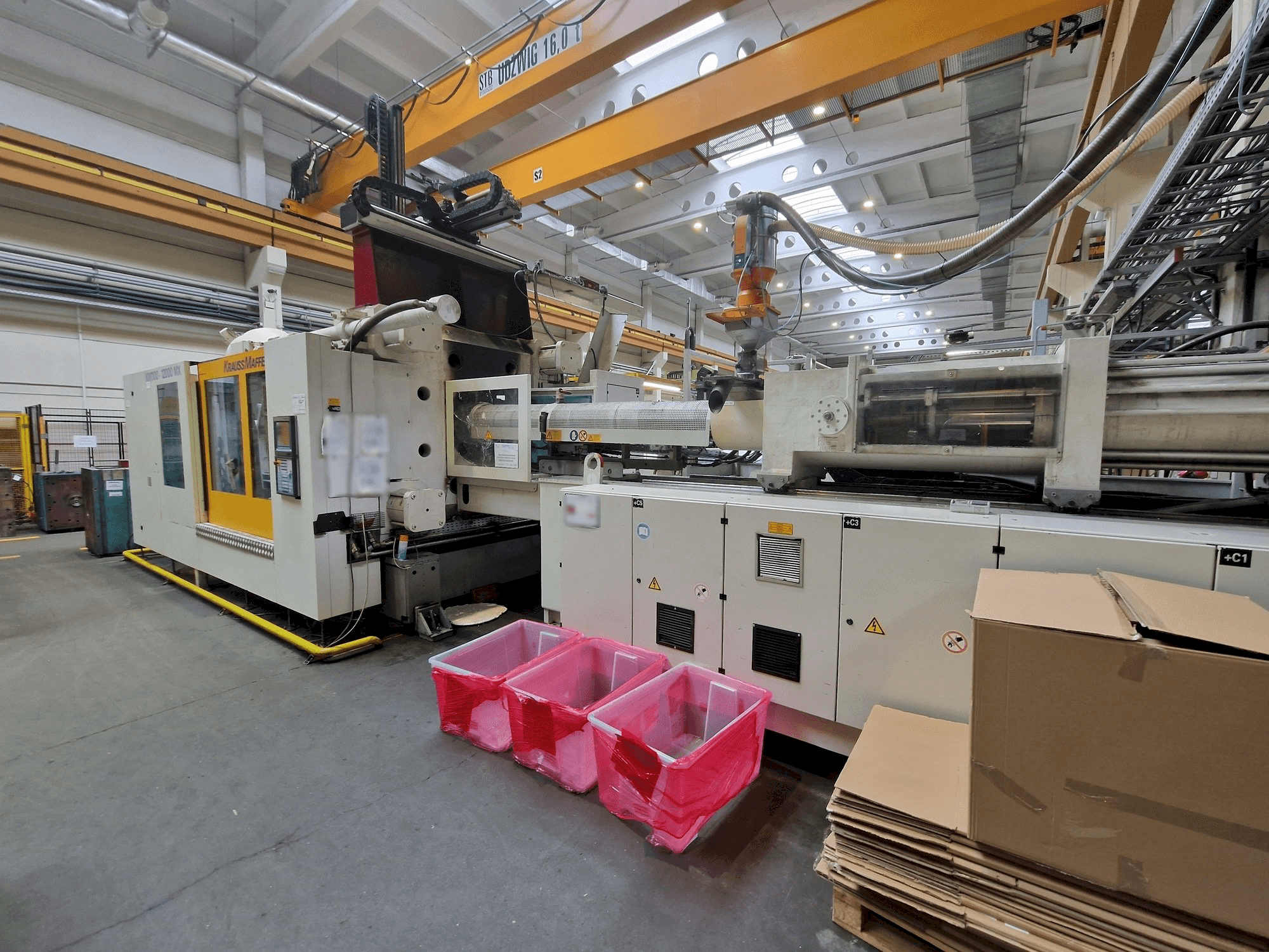 Krauss Maffei 1100-12000 MX Mašinos vaizdas iš priekio