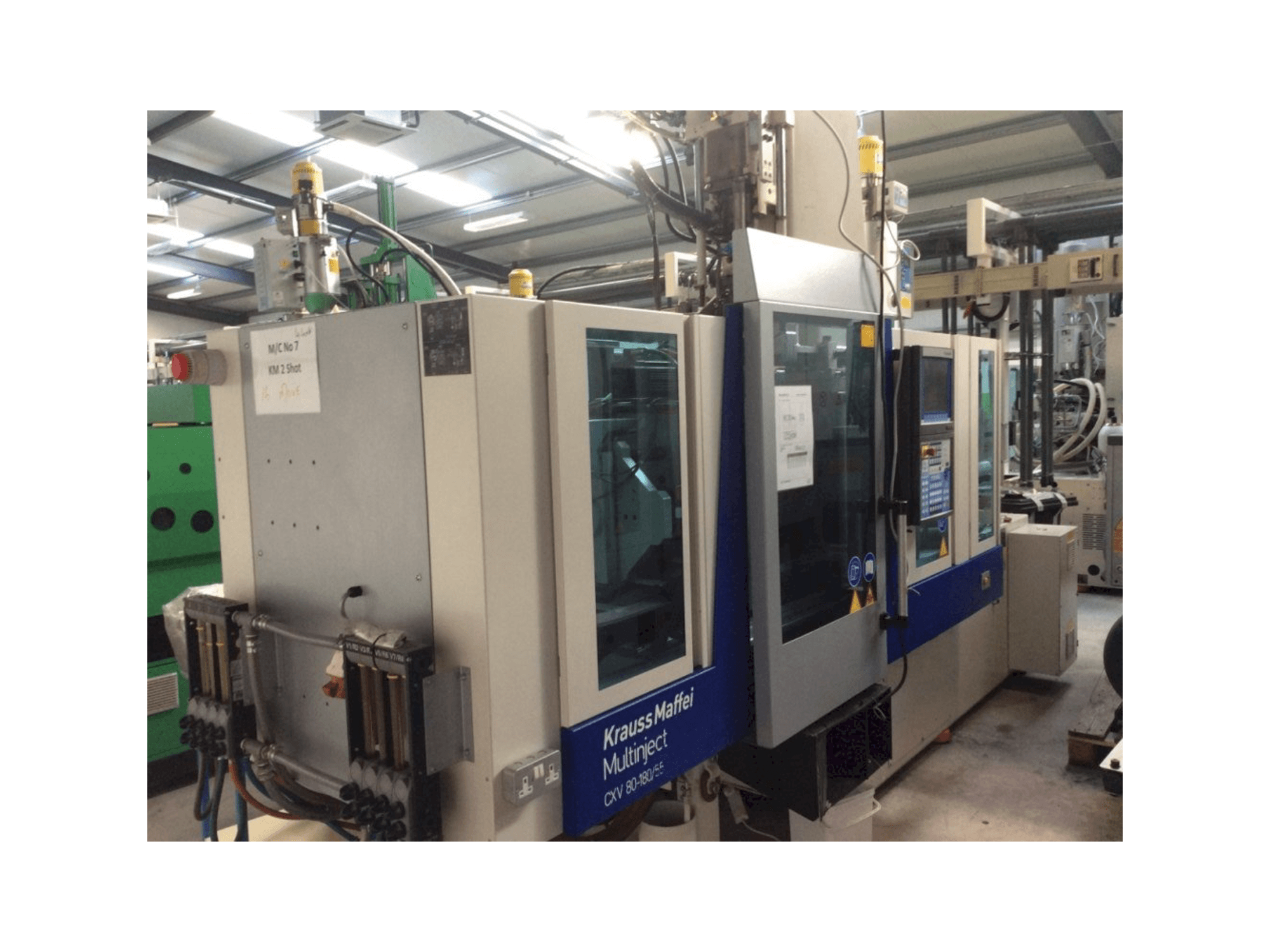 Krauss Maffei Multinject 80-180-55 CX V Mašinos vaizdas iš priekio