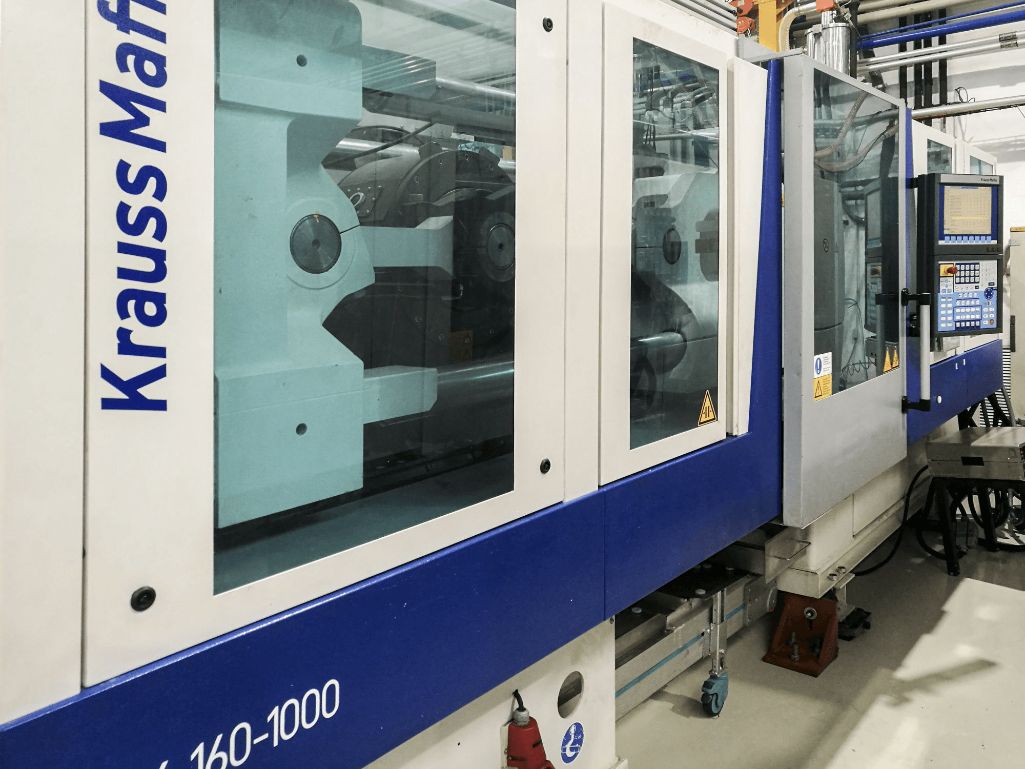 Krauss Maffei 160-1000 EX Mašinos kairės pusės vaizdas
